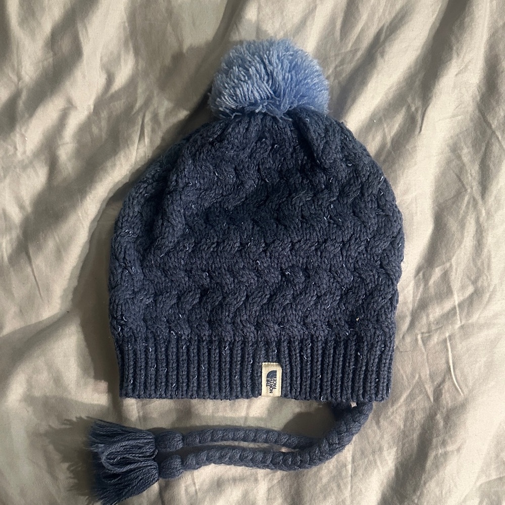 The North Face Navy Cable Knit Hat with Light Blue Pom-Pom